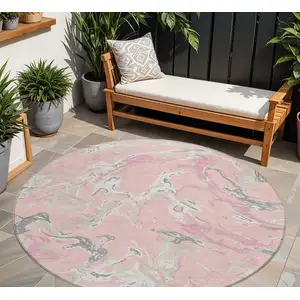 Photo of 8' Pink Gray And Ivory Round Abstract Washable Indoor Outdoor Area Rug