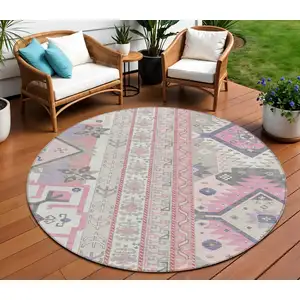Photo of 8' Pink Gray And Ivory Round Aztec Washable Indoor Outdoor Area Rug