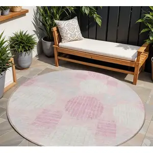 Photo of 8' Pink Gray And Ivory Round Geometric Washable Indoor Outdoor Area Rug