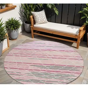 Photo of 8' Pink Gray And Ivory Round Striped Washable Indoor Outdoor Area Rug