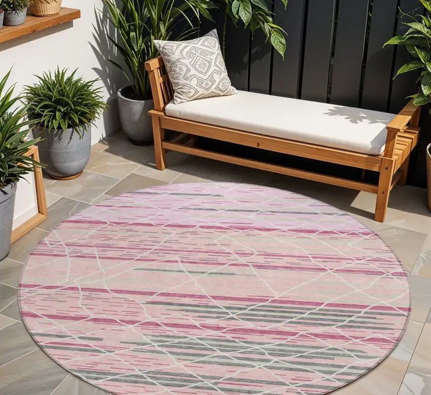 8' Pink Gray And Ivory Round Striped Washable Indoor Outdoor Area Rug Photo 1