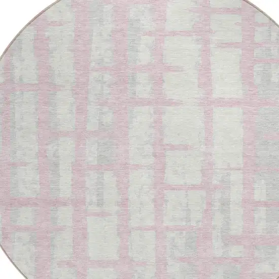 8' Pink Gray And Ivory Round Striped Washable Indoor Outdoor Area Rug Photo 4