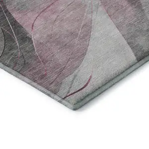 Photo of 8' Pink Gray And Silver Abstract Washable Round Rug With UV Protection