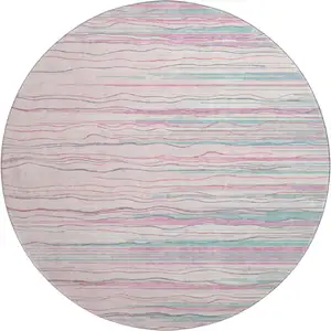 Photo of 8' Pink Gray And Teal Striped Washable Round Rug With UV Protection