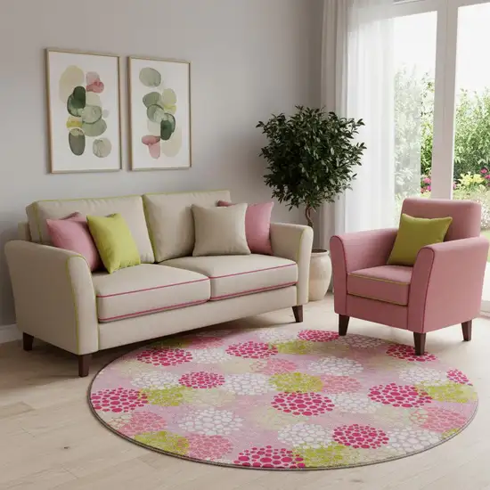 8' Pink Green And Ivory Polka Dot Washable Round Rug With UV Protection Photo 1
