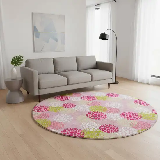 8' Pink Green And Ivory Polka Dot Washable Round Rug With UV Protection Photo 2