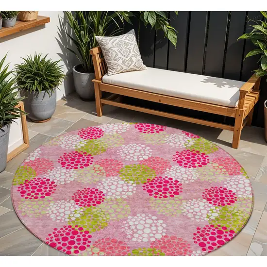 8' Pink Green And Ivory Round Polka Dot Washable Indoor Outdoor Area Rug Photo 1