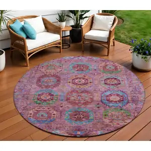 Photo of 8' Pink Green And Mauve Round Medallion Washable Indoor Outdoor Area Rug