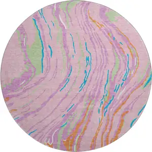 Photo of 8' Pink Green And Orange Abstract Washable Round Rug With UV Protection