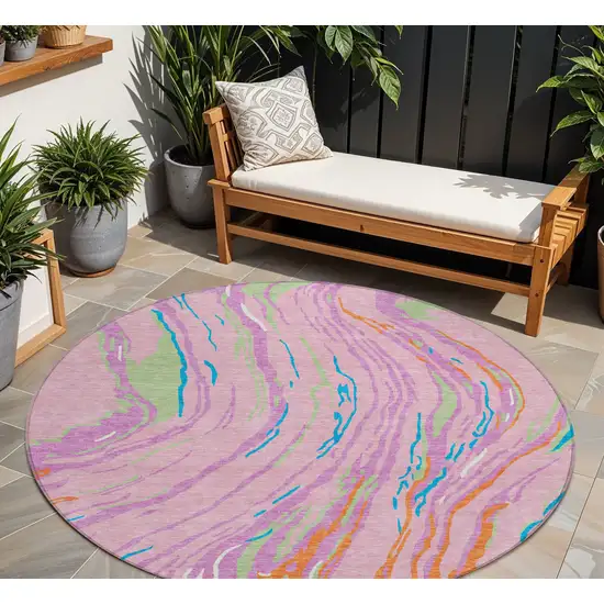8' Pink Green And Teal Blue Round Abstract Washable Indoor Outdoor Area Rug Photo 1
