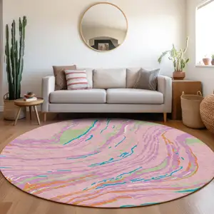 Photo of 8' Pink Green And Teal Blue Round Abstract Washable Indoor Outdoor Area Rug