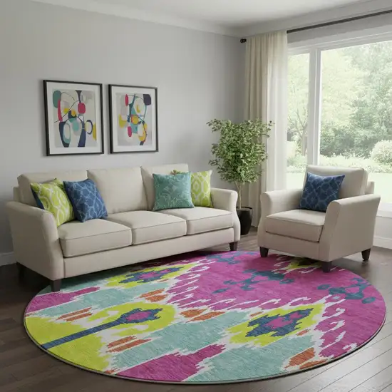 8' Pink Green And Teal Ikat Washable Round Rug With UV Protection Photo 1