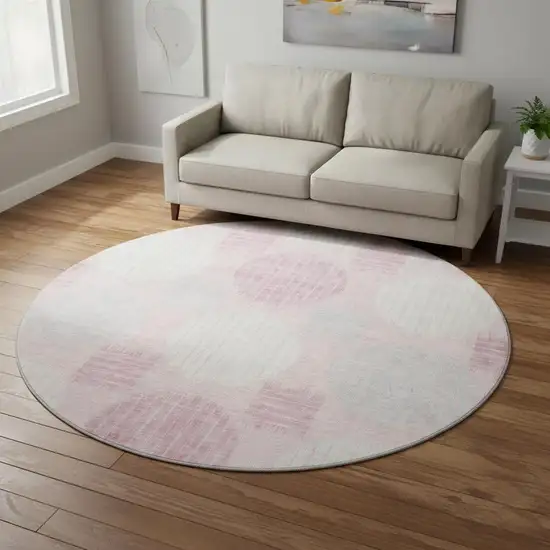 8' Pink Ivory And Gray Geometric Washable Round Rug With UV Protection Photo 2