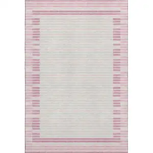 Photo of 8' Pink Ivory And Mauve Striped Washable Area Rug With UV Protection