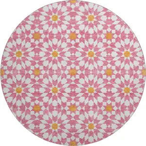 Photo of 8' Pink Ivory And Orange Geometric Washable Round Rug With UV Protection