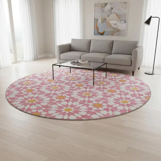 8' Pink Ivory And Orange Geometric Washable Round Rug With UV Protection Photo 2