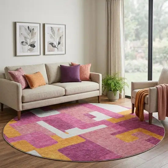 8' Pink Ivory And Orange Geometric Washable Round Rug With UV Protection Photo 1