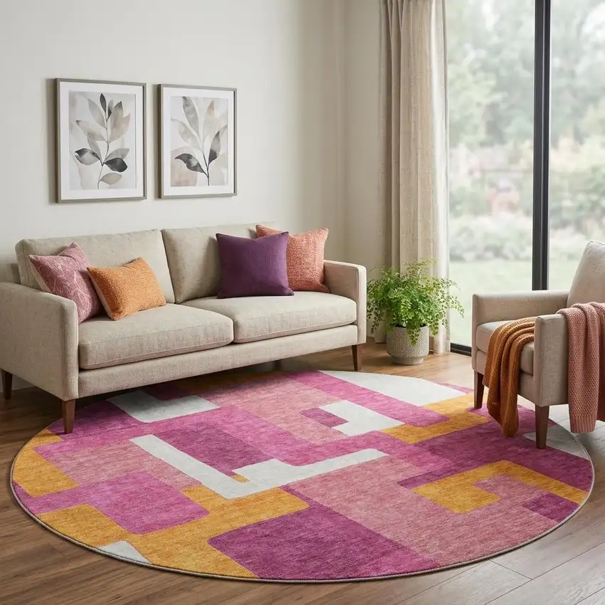 8' Pink Ivory And Orange Geometric Washable Round Rug With UV Protection Photo 1