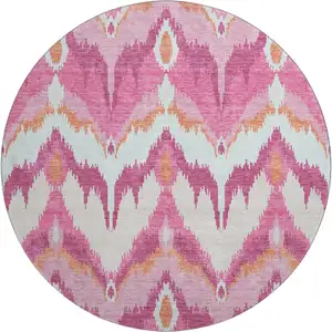 Photo of 8' Pink Ivory And Orange Ikat Washable Round Rug With UV Protection