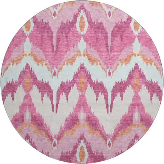 8' Pink Ivory And Orange Ikat Washable Round Rug With UV Protection Photo 1