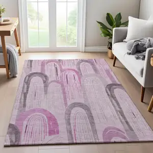 Photo of 8' Pink Lavender And Ivory Geometric Washable Area Rug With UV Protection