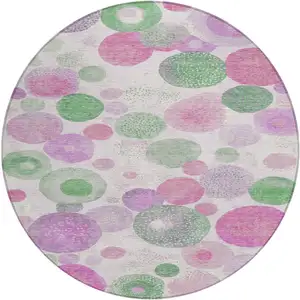 Photo of 8' Pink Mauve And Green Round Geometric Washable Indoor Outdoor Area Rug