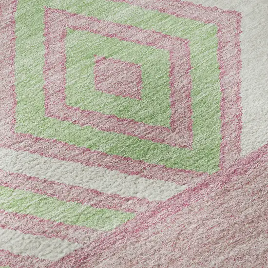 8' Pink Mint Green And Ivory Southwestern Washable Round Rug With UV Protection Photo 8