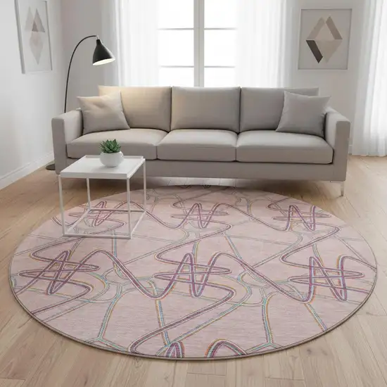 8' Pink Orange And Blue Geometric Washable Round Rug With UV Protection Photo 2