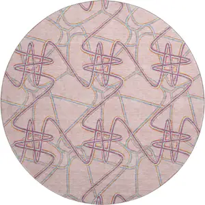 Photo of 8' Pink Orange And Blue Geometric Washable Round Rug With UV Protection