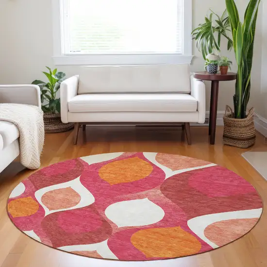 8' Pink Orange And Ivory Ogee Washable Round Rug With UV Protection Photo 5