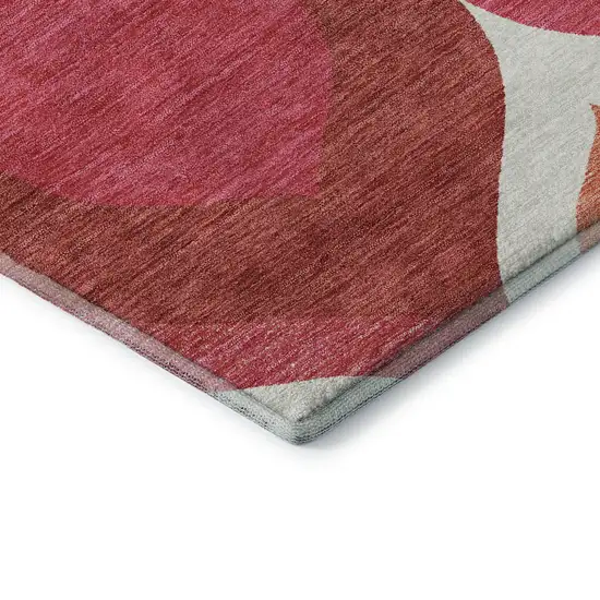 8' Pink Orange And Ivory Ogee Washable Round Rug With UV Protection Photo 7