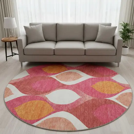 8' Pink Orange And Ivory Ogee Washable Round Rug With UV Protection Photo 2