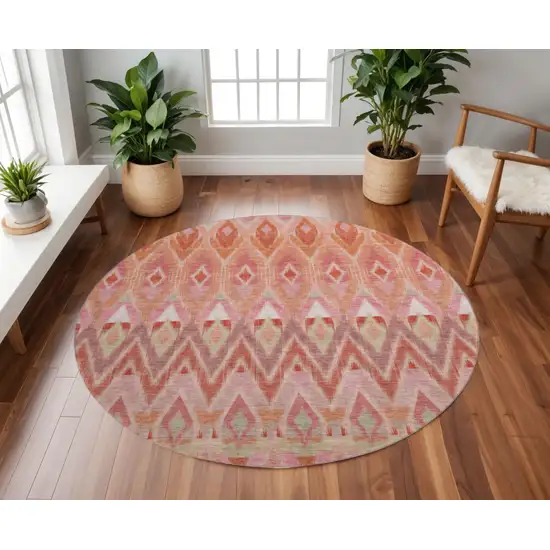 8' Pink Orange And Mint Green Southwestern Washable Round Rug With UV Protection Photo 2