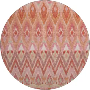 Photo of 8' Pink Orange And Mint Green Southwestern Washable Round Rug With UV Protection