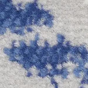 Photo of 8' Pink and Ivory Abstract Distressed Non Skid Runner Rug