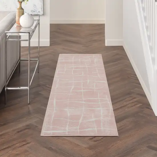 8' Pink and Ivory Abstract Distressed Non Skid Runner Rug Photo 4