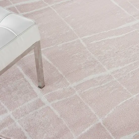 8' Pink and Ivory Abstract Round Rug Photo 9