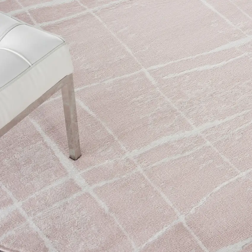 8' Pink and Ivory Abstract Round Rug Photo 9