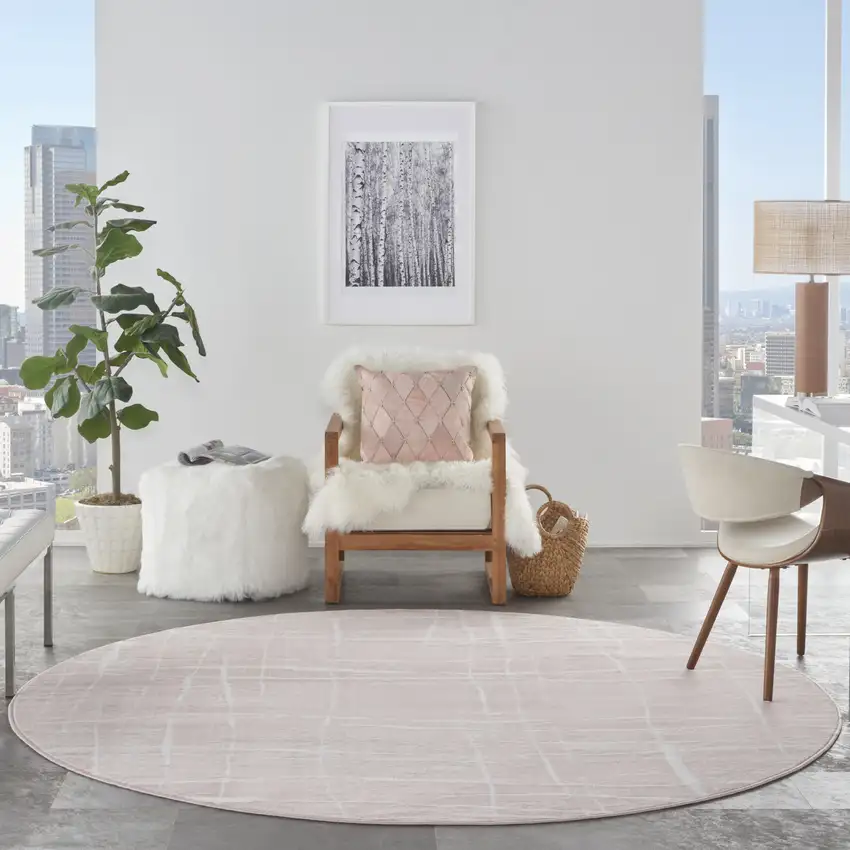 8' Pink and Ivory Abstract Round Rug Photo 5