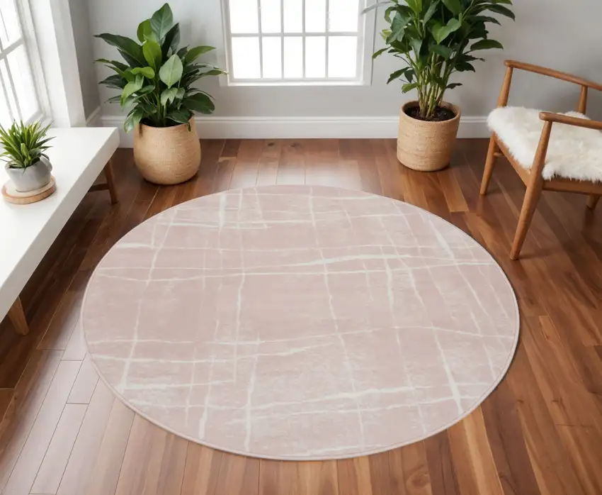 8' Pink and Ivory Abstract Round Rug Photo 1