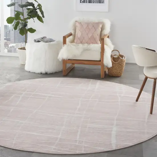 8' Pink and Ivory Abstract Round Rug Photo 4