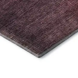 Photo of 8' Plum And Beige Abstract Washable Round Rug With UV Protection