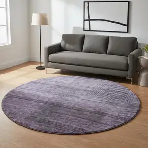 Photo of 8' Plum And Gray Striped Washable Round Rug With UV Protection