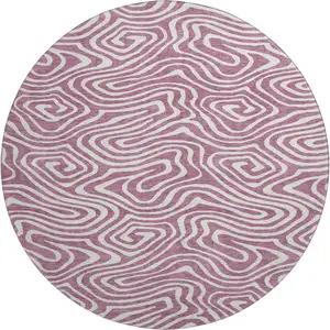 Photo of 8' Plum And Ivory Abstract Washable Round Rug With UV Protection
