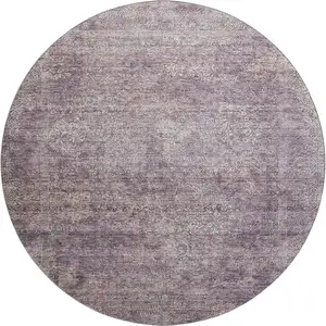 Photo of 8' Plum And Ivory Abstract Washable Round Rug With UV Protection
