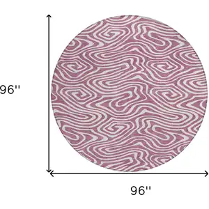 Photo of 8' Plum And Ivory Round Abstract Washable Indoor Outdoor Area Rug