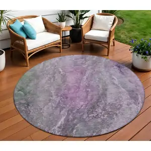 Photo of 8' Plum And Ivory Round Abstract Washable Indoor Outdoor Area Rug
