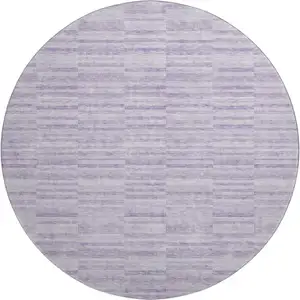 Photo of 8' Plum And Ivory Striped Washable Round Rug With UV Protection