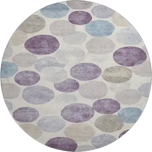 Photo of 8' Plum Beige And Blue Geometric Washable Round Rug With UV Protection