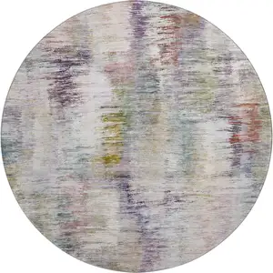 Photo of 8' Plum Gold And Ivory Abstract Washable Round Rug With UV Protection